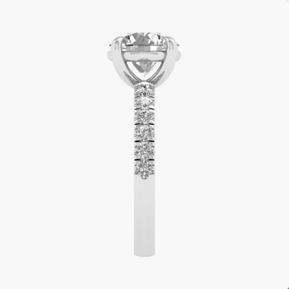 Diamond ring with a trapezoid-shaped center stone on a white background