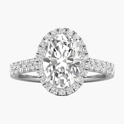 Diamond ring with a large central gemstone and smaller stones on a white background
