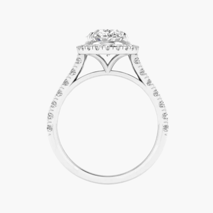 Silver ring with diamond accents on a white background