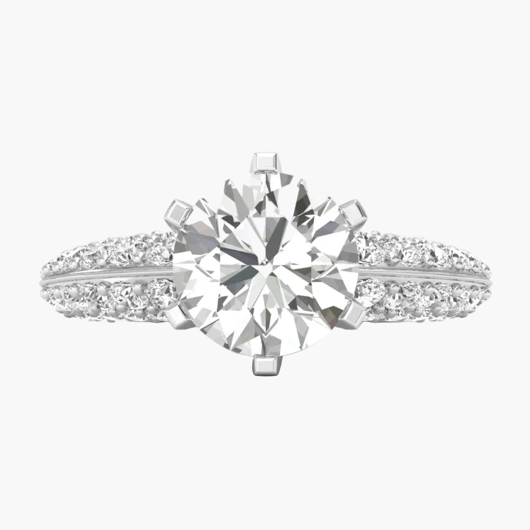 Diamond ring with a large central gemstone and smaller stones on a white background