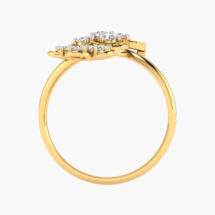 Gold ring with diamond accents on a white background