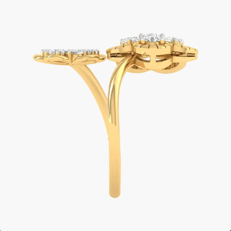 Gold ring with diamond accents on a white background