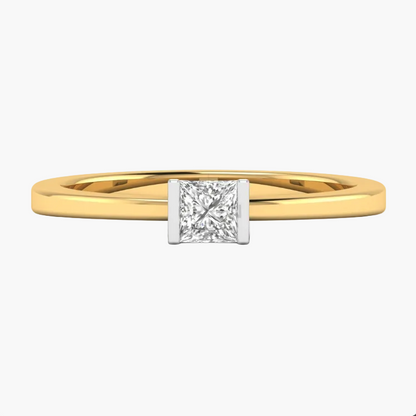 Gold ring with a diamond on a white background
