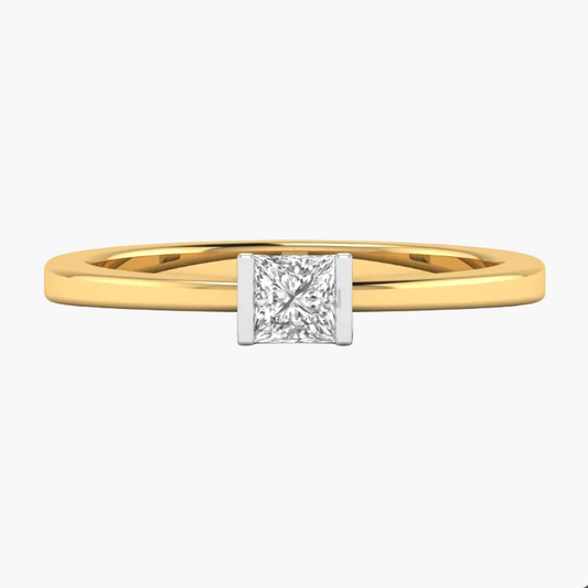 Gold ring with a diamond on a white background