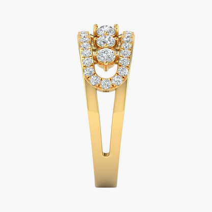Gold ring with diamond accents on a white background