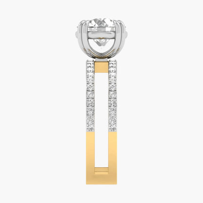 Gold and silver earring with clear gemstone on a white background