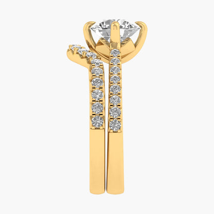 Gold ring with a diamond on a white background