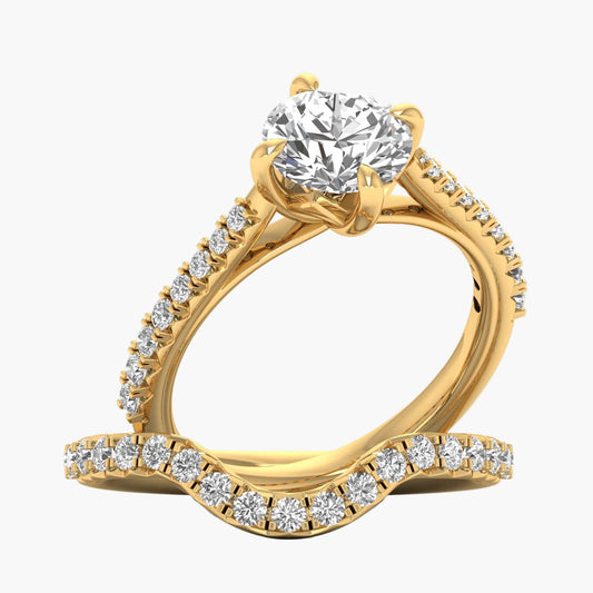 Gold ring with a large diamond and smaller diamonds on the band against a white background
