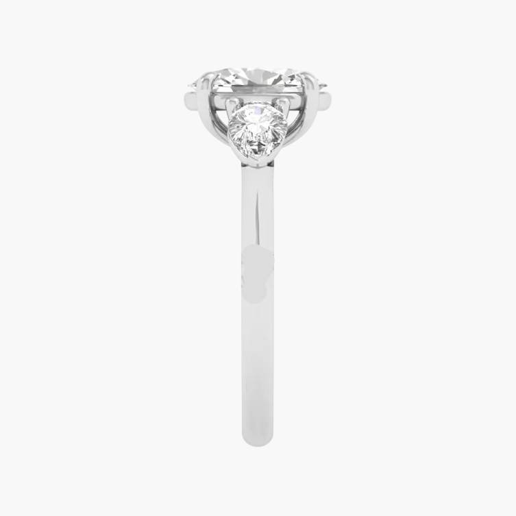 Heart-shaped diamond ring on a dark background