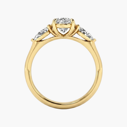 Gold ring with a heart-shaped center stone and smaller stones on a white background, featuring the brand 'Green Lab'.
