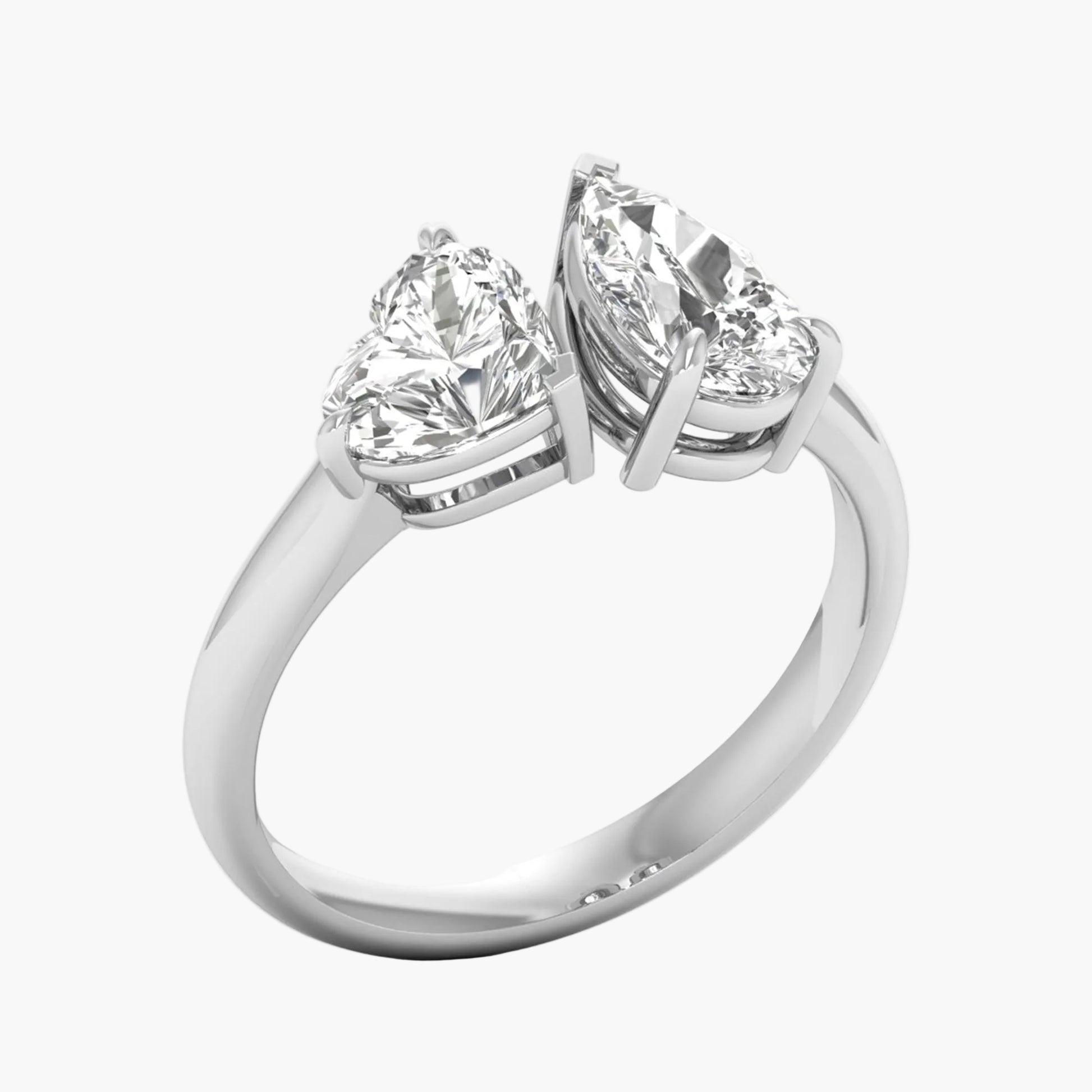 Silver ring with two pear-shaped diamonds on a white background, branded 'Green Lab'.