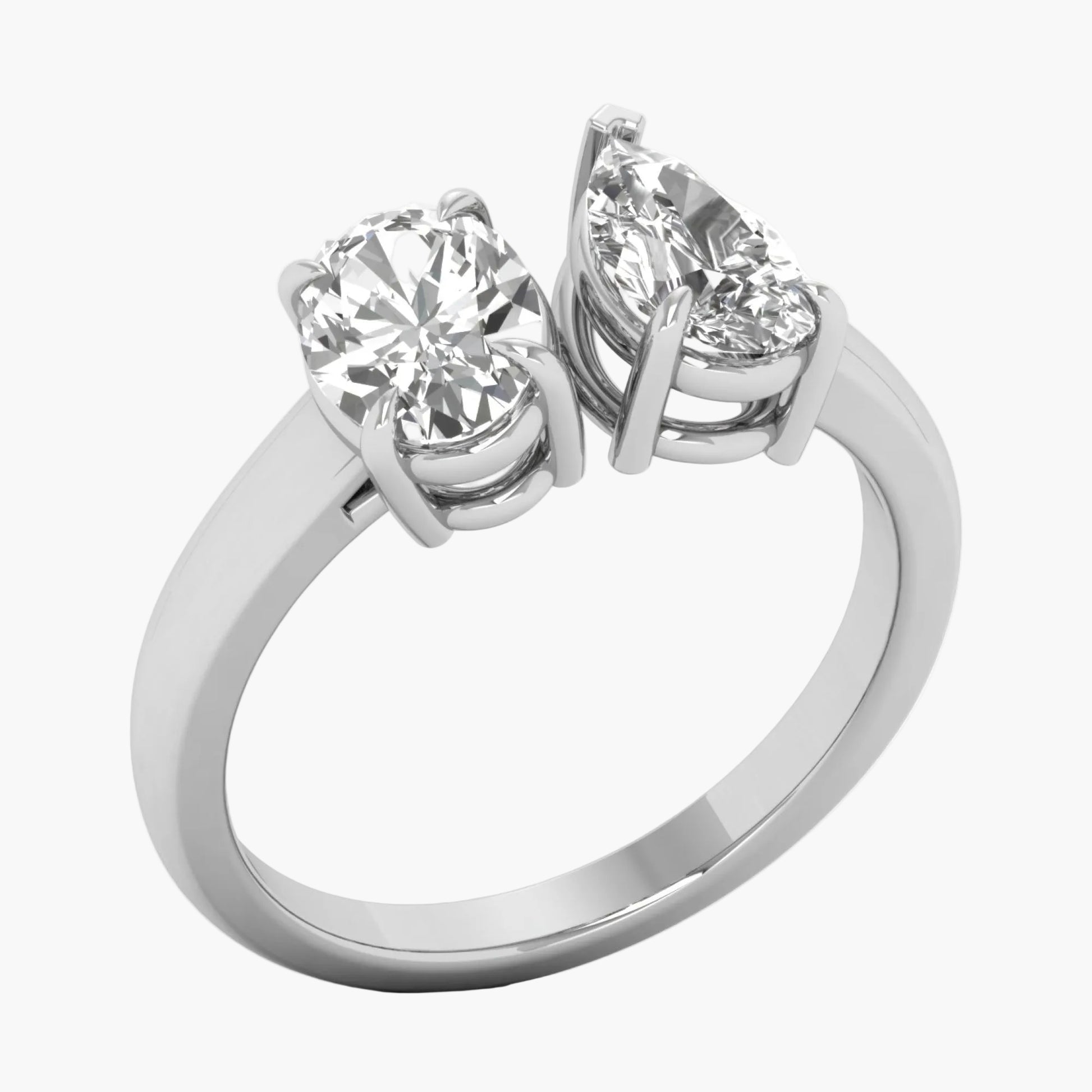 Silver ring with two diamonds on a white background