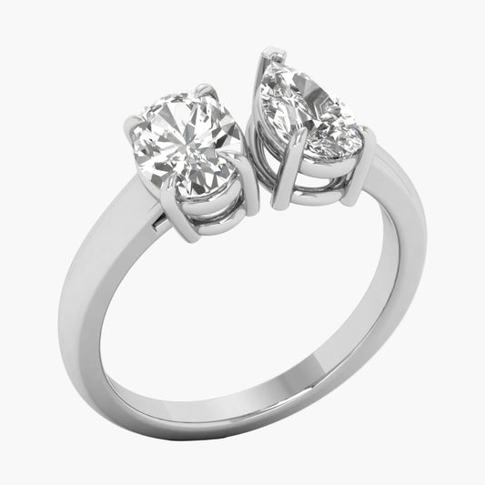Silver ring with two diamonds on a white background
