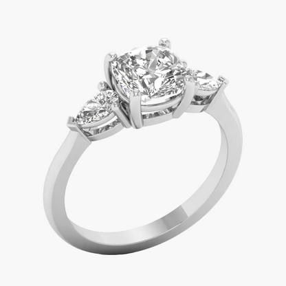 Diamond ring with three stones on a white background