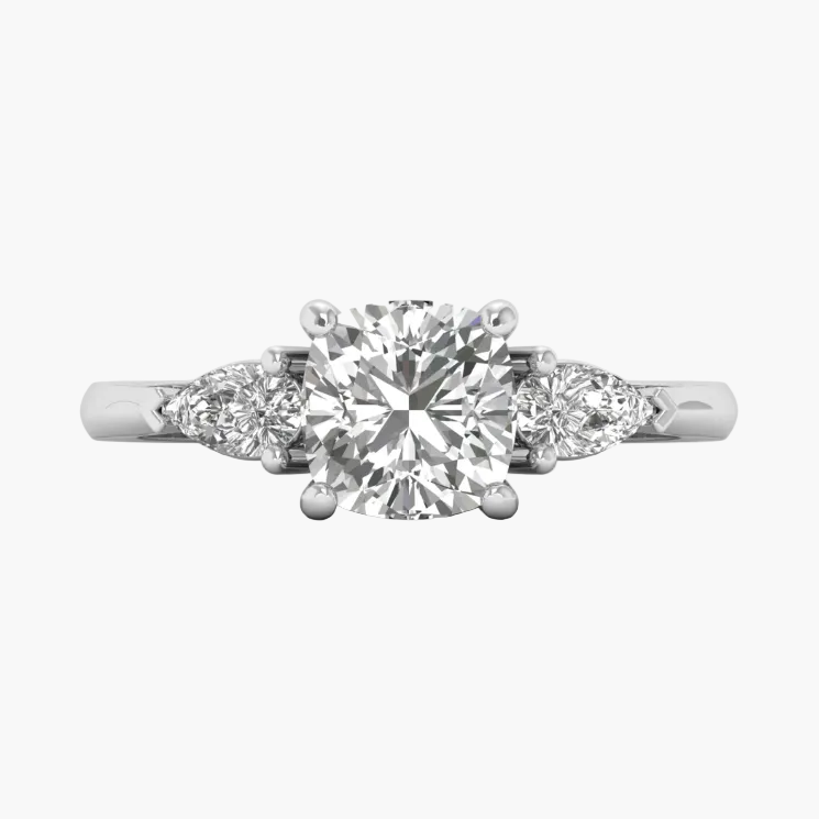 Diamond ring with three diamonds on a white background