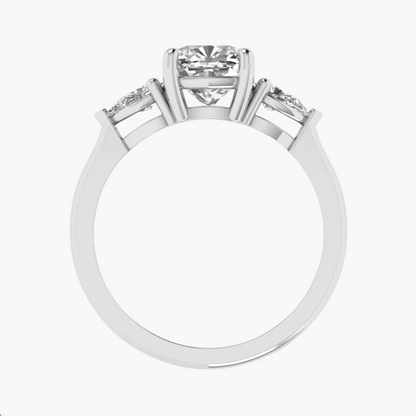 Diamond ring with three stones on a white background