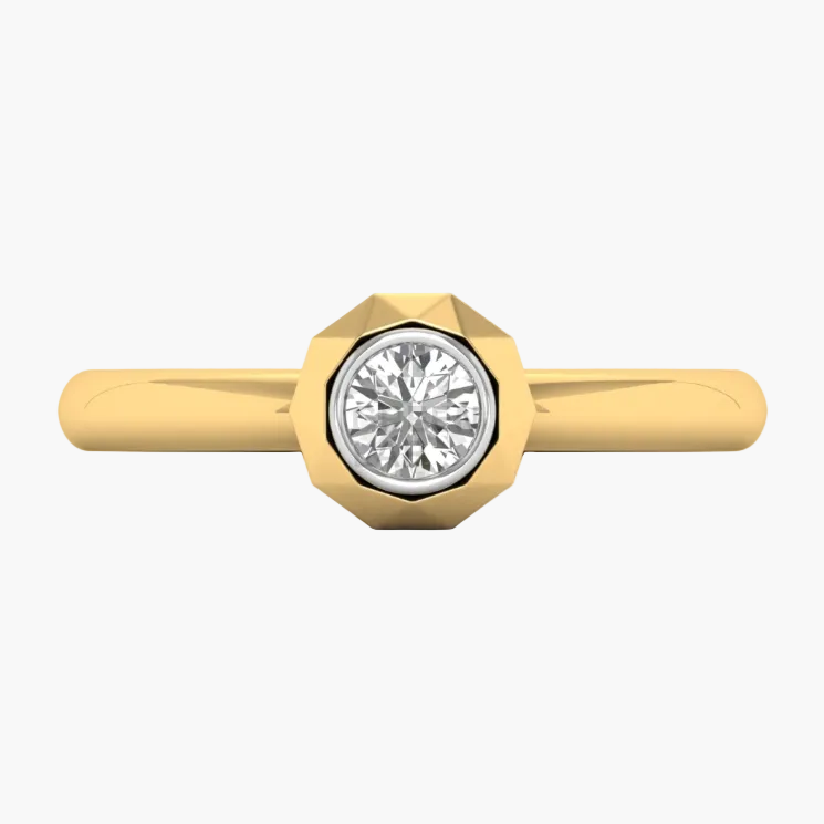 Gold ring with a diamond on a white background