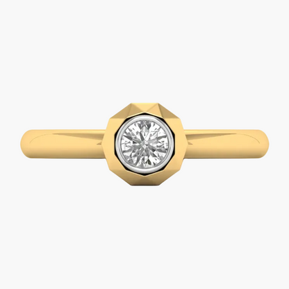 Gold ring with a diamond on a white background