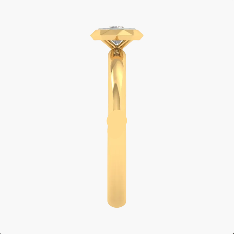 Gold ring with a diamond on a white background