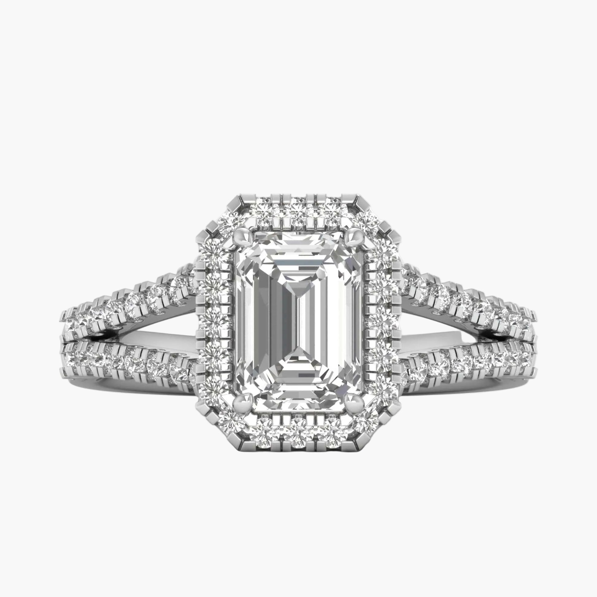 Diamond ring with emerald-cut center stone on a white background