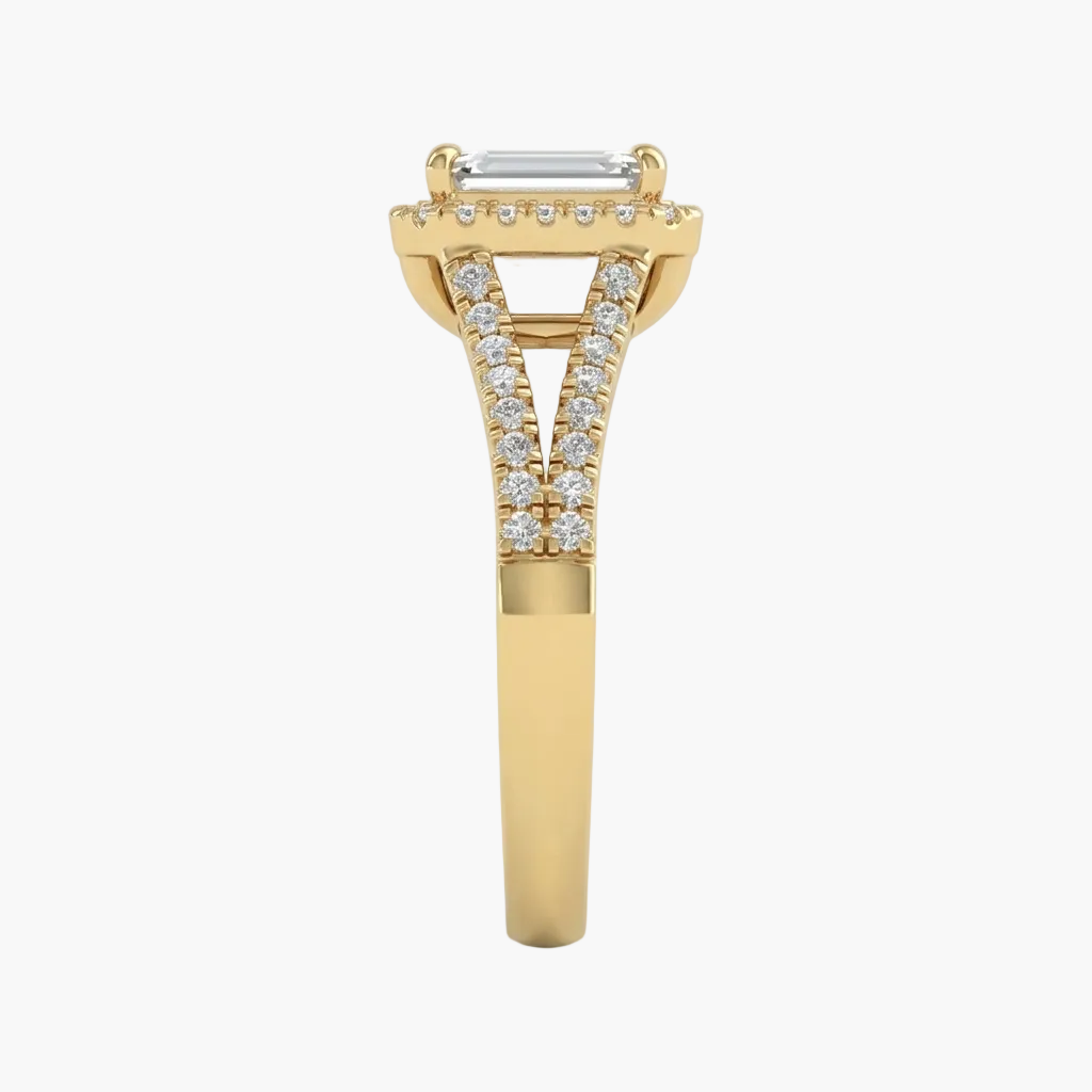 Gold ring with diamond accents on a light gray background