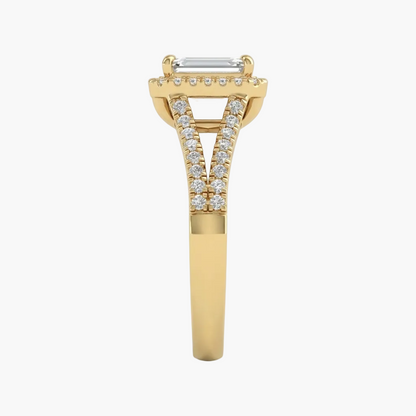Gold ring with diamond accents on a light gray background