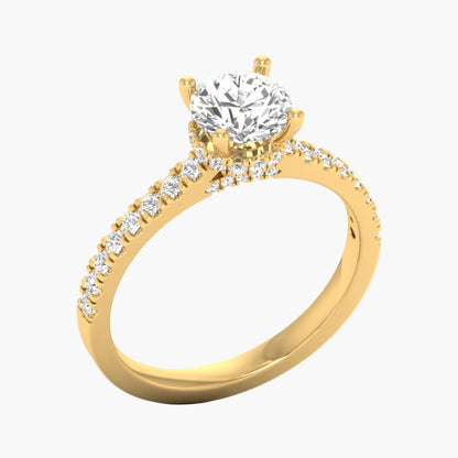 Gold ring with a large diamond and smaller diamonds on the band against a white background