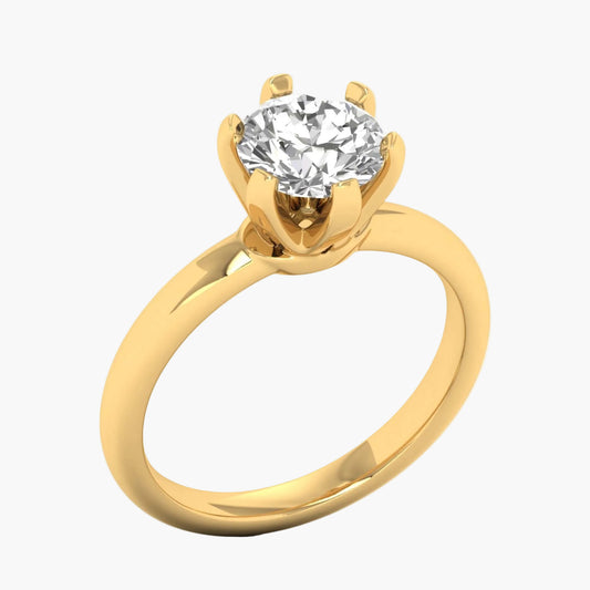 Gold ring with a diamond on a white background