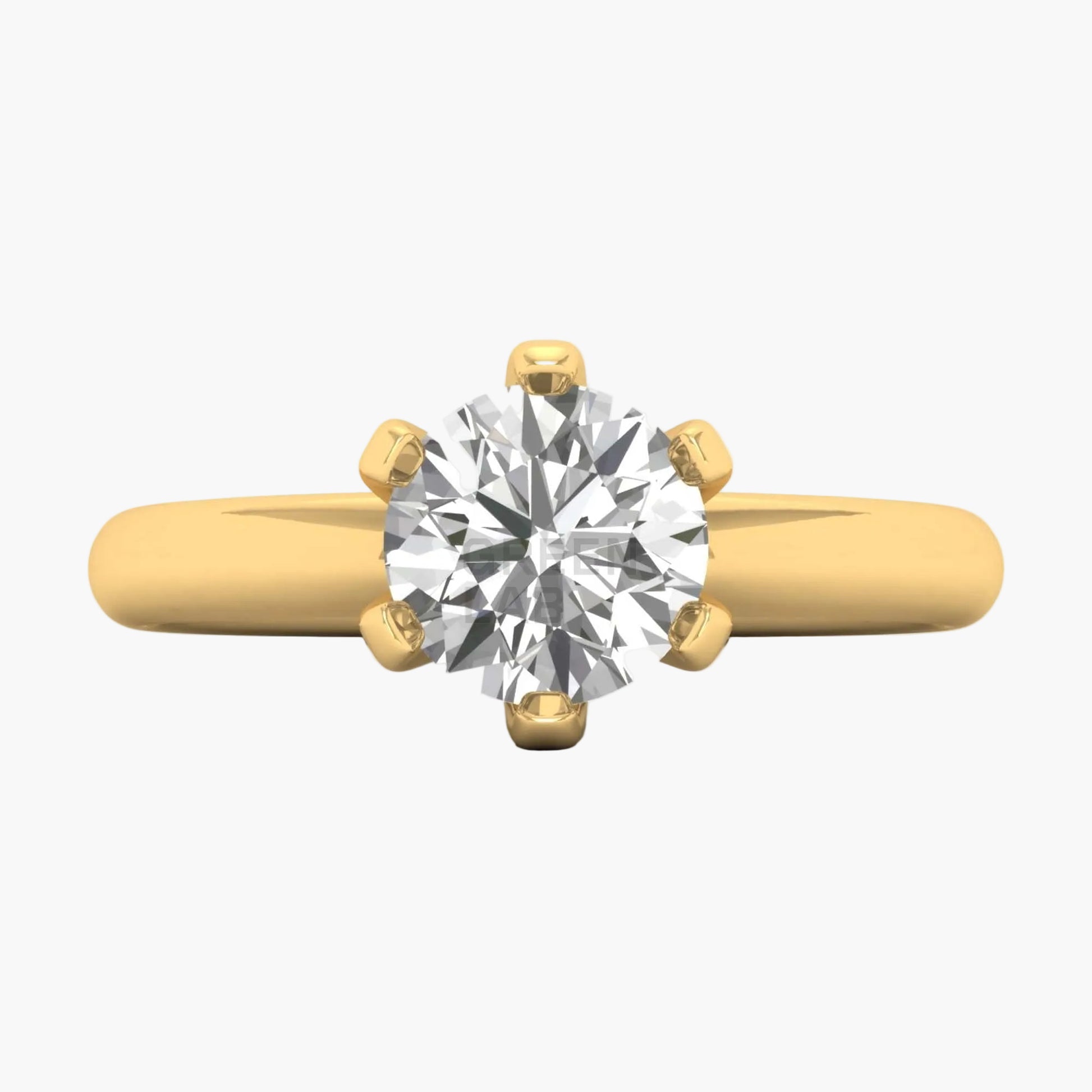 Gold ring with a large diamond on a white background