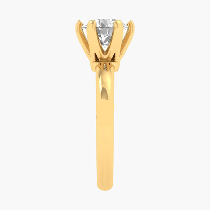 Gold ring with a diamond on a white background