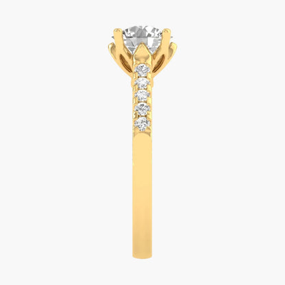 Gold ring with a diamond on a white background