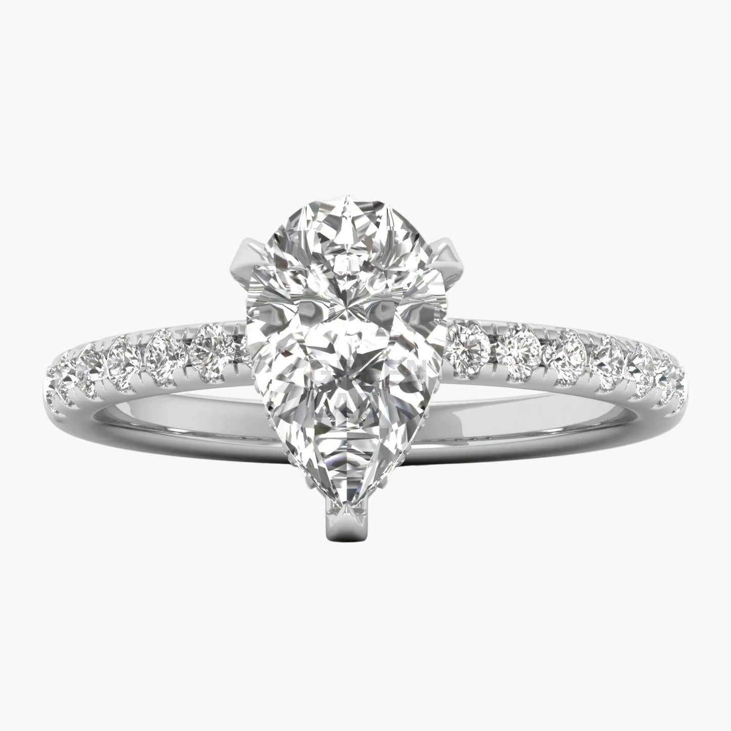 Diamond ring with a pear-shaped center stone on a white background