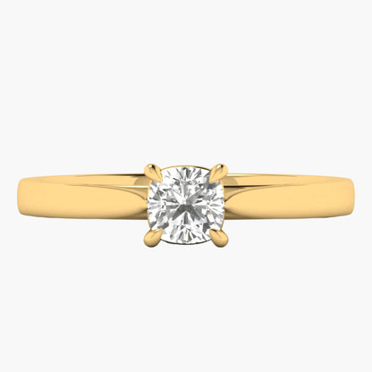 Gold ring with a diamond on a white background
