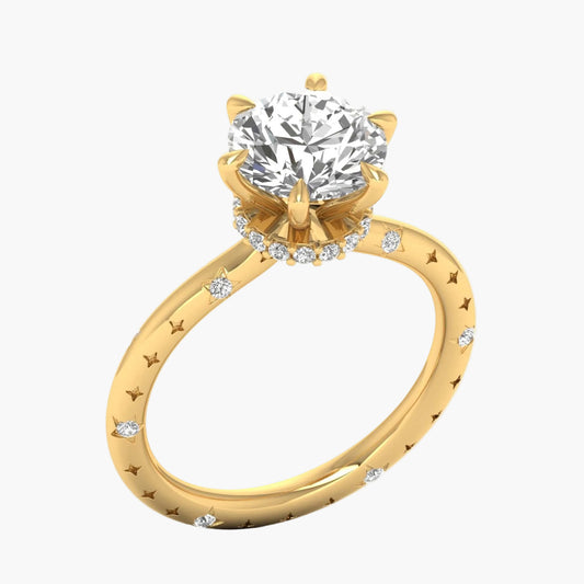 Gold ring with a large diamond and smaller diamonds on the band, branded 'Green Lab'.