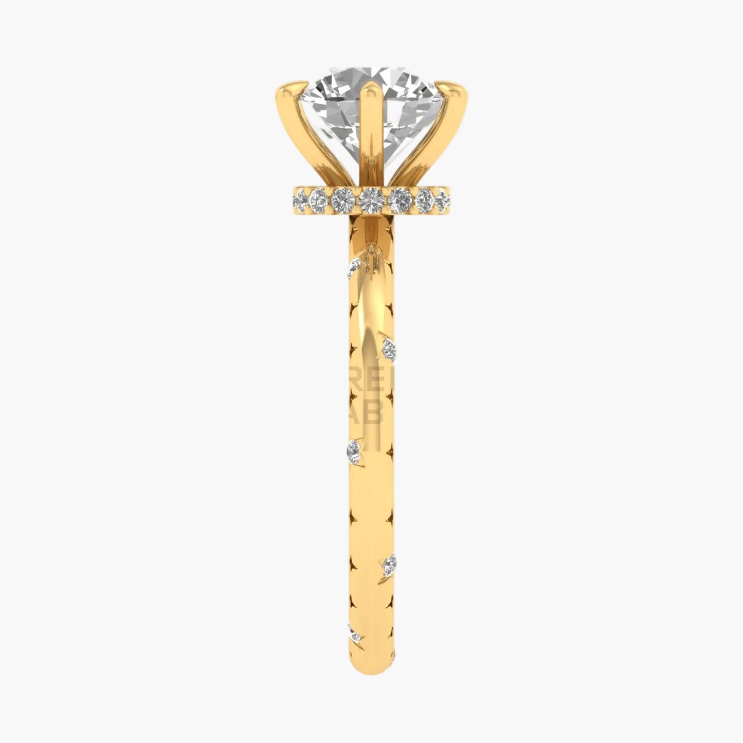 Gold ring with a diamond on a white background