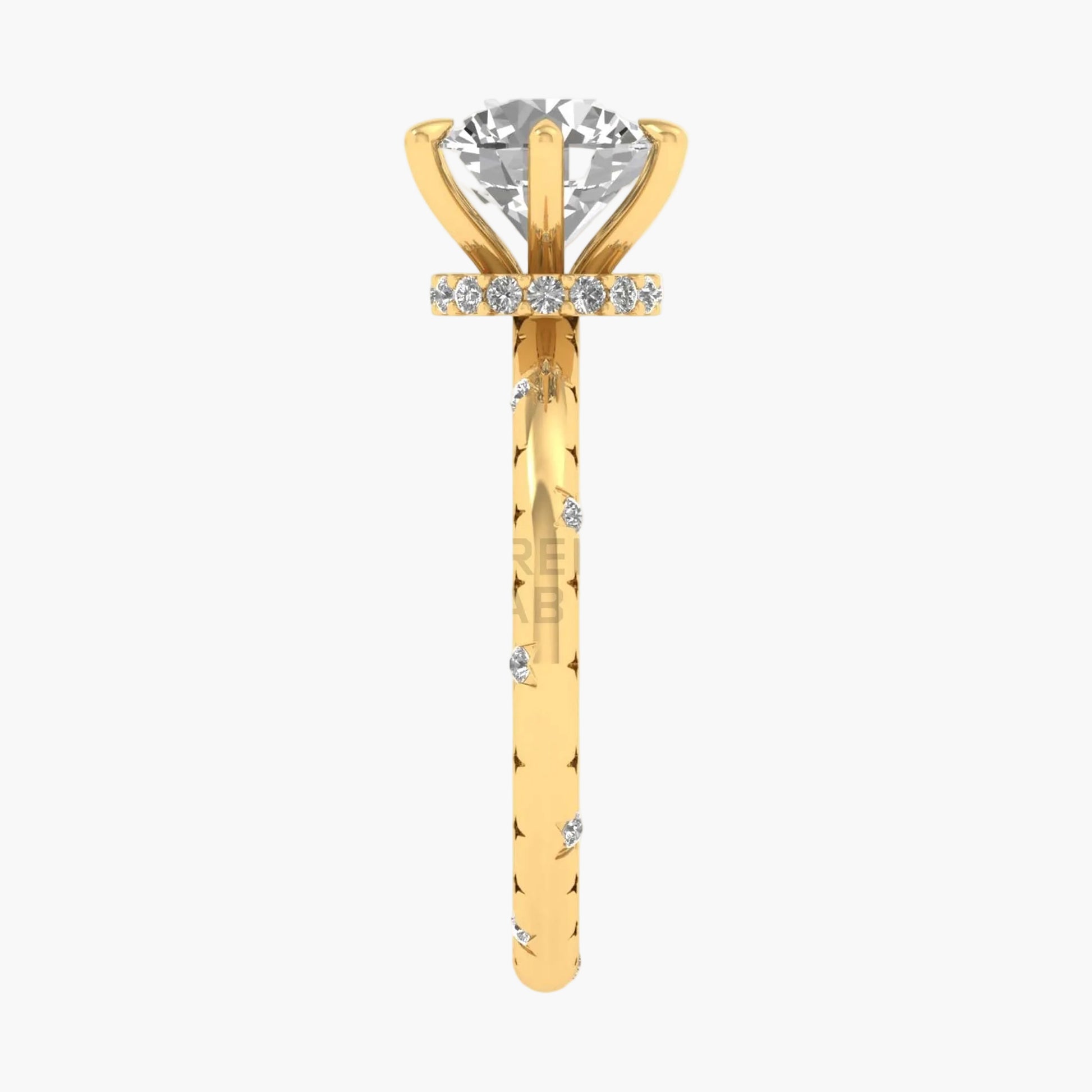Gold ring with a diamond on a white background
