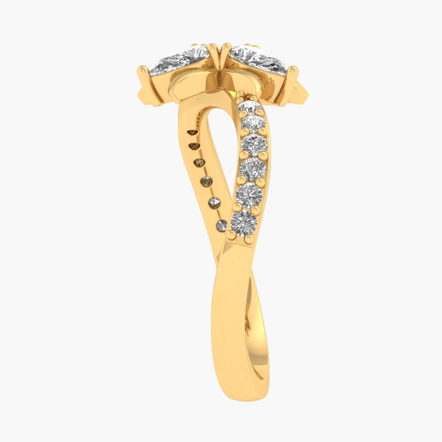 Gold ring with diamond accents on a white background