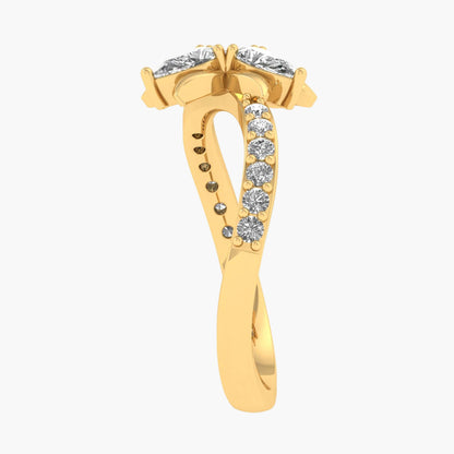 Gold ring with diamond accents on a white background