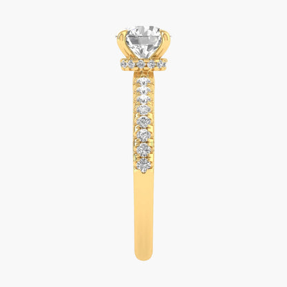 Gold ring with a large central gemstone and smaller stones on a white background