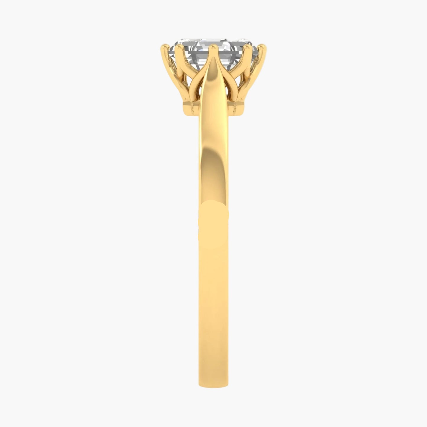 Gold ring with a diamond on a white background