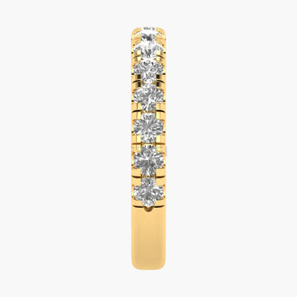 Gold ring with diamonds on a white background