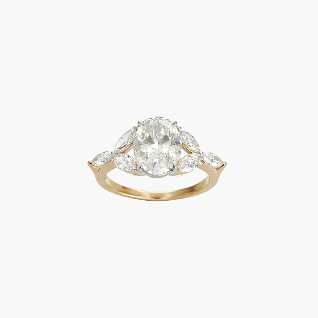 Gold ring with a large diamond and smaller diamonds on a white background