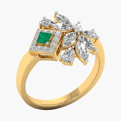 Gold ring with emerald and diamonds on a white background