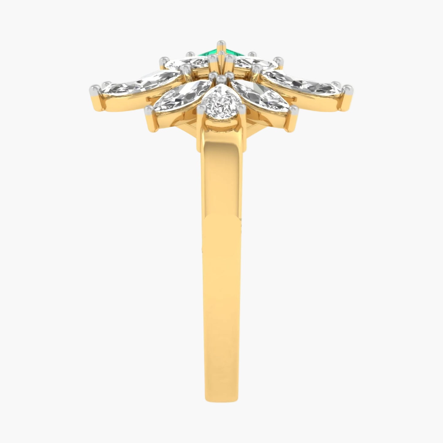 Gold ring with diamonds and a green gemstone on a white background