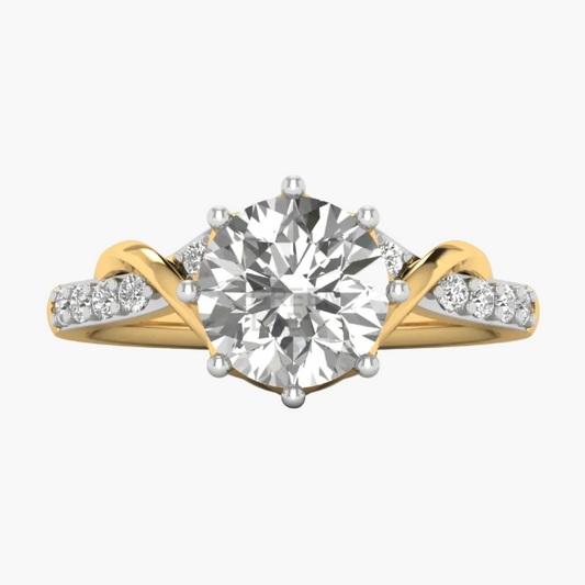 A yellow gold diamond ring with a large round-cut center stone and smaller diamonds set along curved split shanks, shown on a clean white background.
