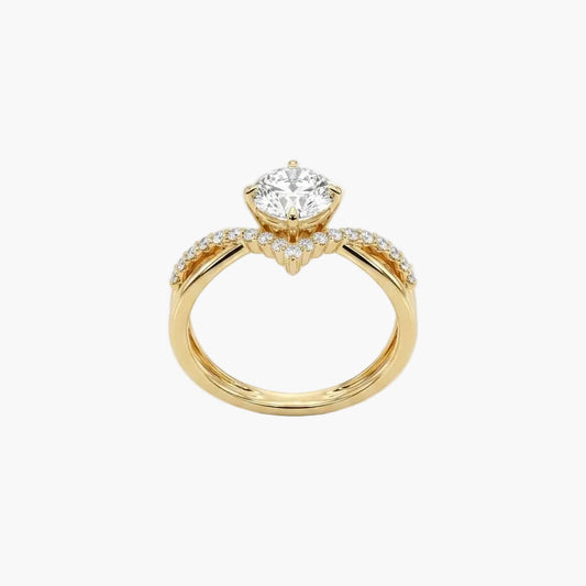 Gold ring with a diamond on a light gray background
