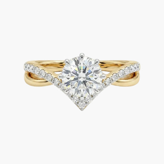 Gold ring with a large diamond on a white background