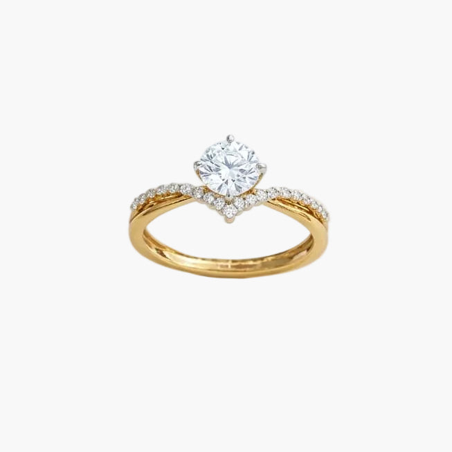 Gold ring with a diamond on a white background