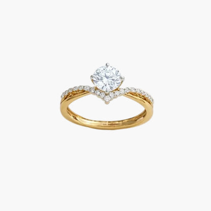 Gold ring with a diamond on a white background