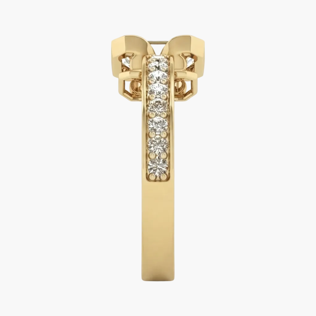 A yellow gold ring shown from the side on a clean white background, featuring a pavé diamond center channel and geometric diamond-shaped side accents.